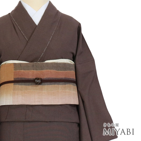 小紋 リサイクル 身丈159.8cm 裄64.4cm 単衣 さつま絣 後身頃居敷当て付き ブラウン Mサイズ お洒落 木綿 洗える着物 広衿 Sランク