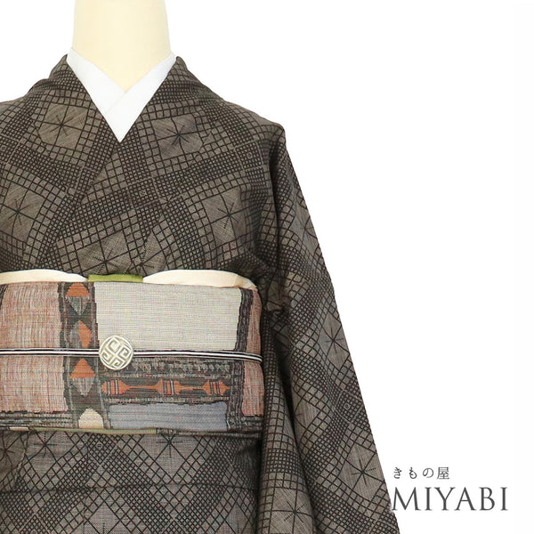 紬 リサイクル 身丈158.5cm 裄68.8cm 袷 斜め格子柄 ブラウン Mサイズ お洒落 カジュアル しつけ糸 正絹 広衿 Sランク