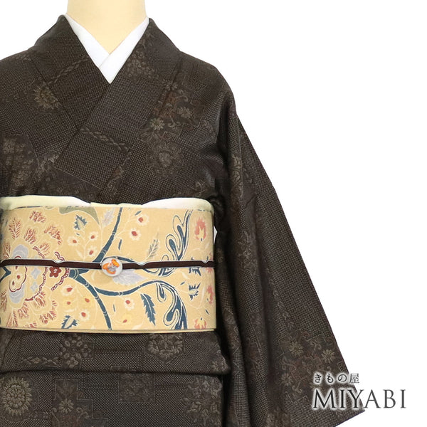 小紋 リサイクル 身丈156.2cm 裄65cm 袷 紬調絣に点描柄 地紋 ブラウン Mサイズ お洒落 カジュアル ポリエステル 洗える着物 広衿 Sランク