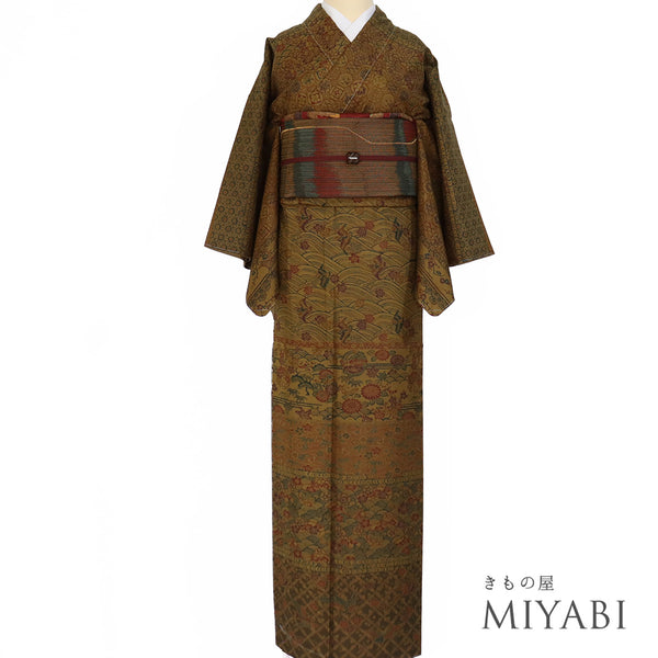 訪問着 リサイクル 身丈152.7cm 裄63.8cm 袷 型染め 青海波や草花柄 織り出し 大島紬 ブラウン Sサイズ お洒落 正絹 広衿 Sランク