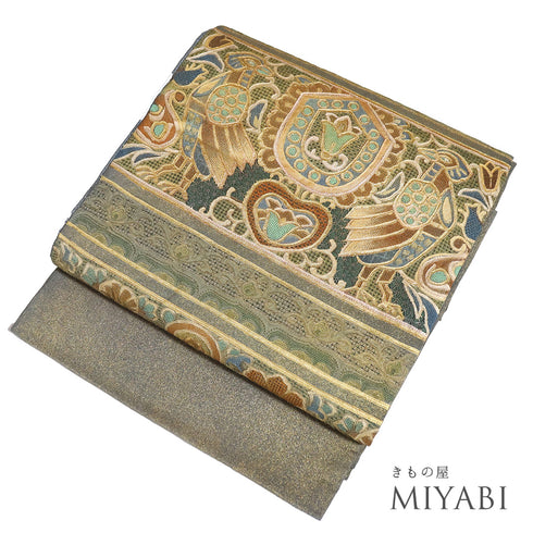 袋帯 リサイクル 帯丈468cm ポイント柄 汕頭 壁画柄 オリエンタル柄 ゴールド LLサイズ 正絹 Sランク お洒落