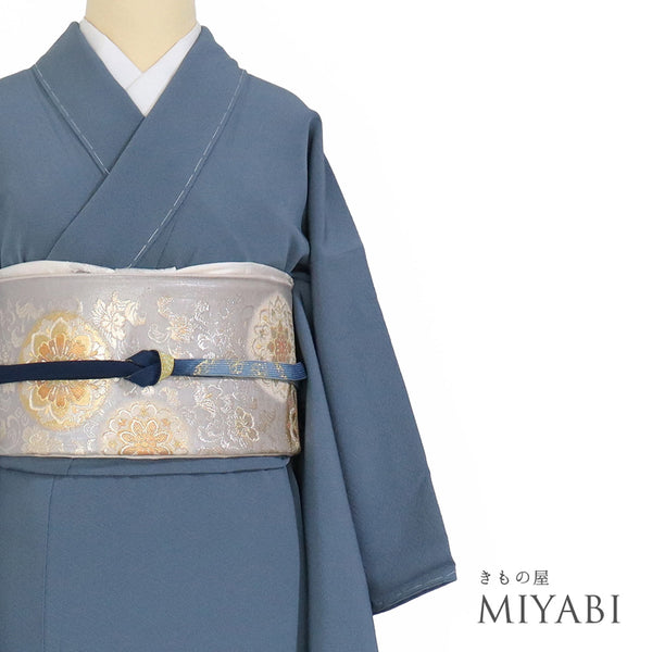 色無地 リサイクル 身丈156.5cm 裄64cm 袷 ゆったりサイズ ブルー Mサイズ セミフォーマル 一つ紋 しつけ糸 正絹 広衿 地紋なし Sランク