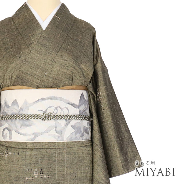 紬 リサイクル 身丈160.3cm 裄63.6cm 袷 幾何学柄 グリーン Mサイズ カジュアル 正絹 バチ衿 Sランク