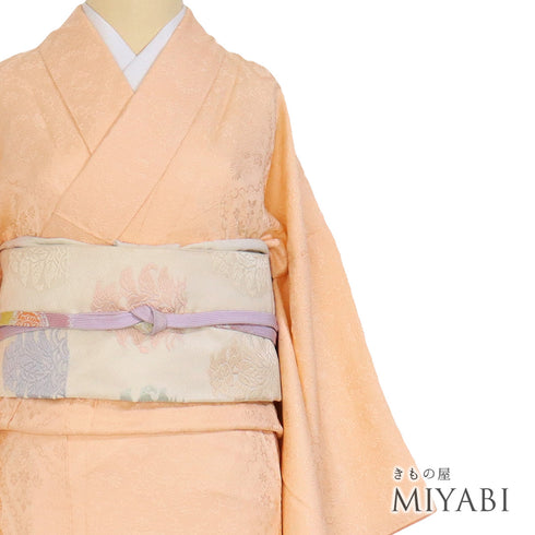 色無地 リサイクル 身丈166.5cm 裄66cm 袷 デザイン菱文様 衿先布付き オレンジ LLサイズ セミフォーマル 正絹 バチ衿 地紋あり Sランク