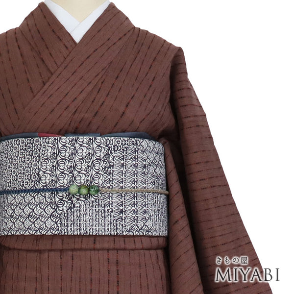 紬 リサイクル 身丈163.8cm 裄64cm 袷 竜巻絞り 刺繍 ブラウン Lサイズ お洒落 カジュアル しつけ糸 正絹 バチ衿 Sランク