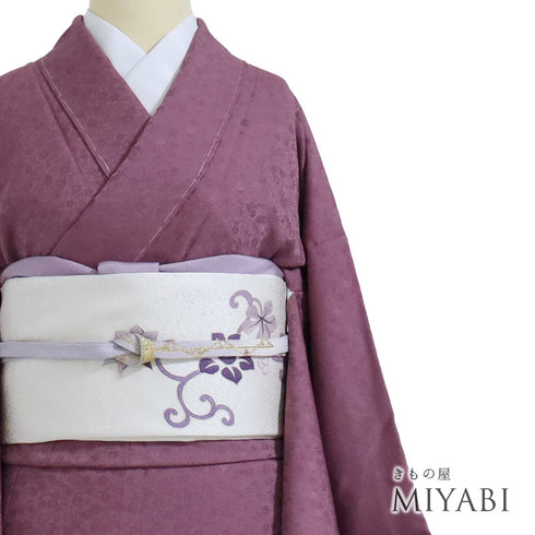 色無地 リサイクル 身丈158.5cm 裄65.6cm 袷 菊や梅柄 パープル Mサイズ セミフォーマル 一つ紋 しつけ糸 正絹 広衿 地紋あり Sランク