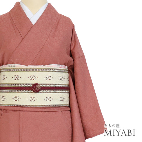 色無地 リサイクル 身丈150.5cm 裄62.4cm 袷 小花柄 ピンク Sサイズ セミフォーマル 落款 一つ紋 正絹 広衿 地紋あり Sランク