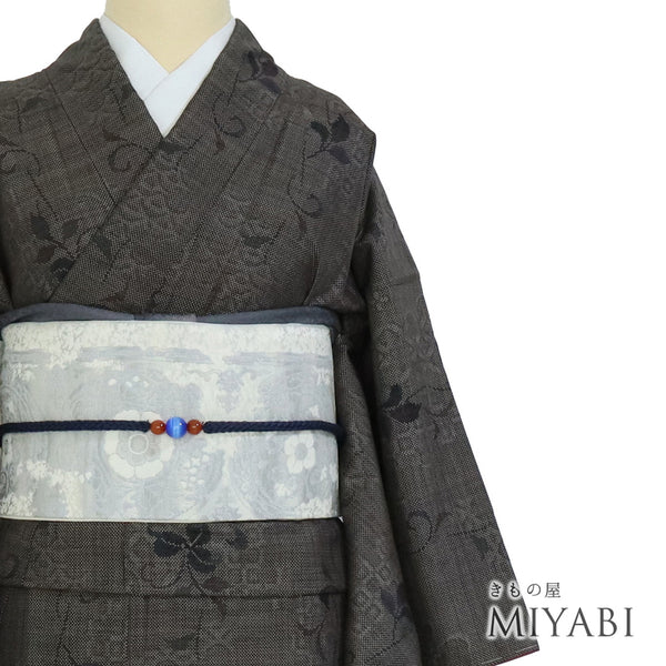 紬 リサイクル 身丈159.5cm 裄63.6cm 袷 大島紬 つる花柄 ブラウン Mサイズ カジュアル お洒落 証紙 しつけ糸 正絹 広衿 Sランク