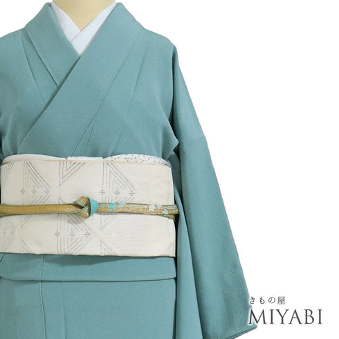 色無地 リサイクル 身丈159.5cm 裄66.4cm 袷 グリーン Mサイズ お洒落 カジュアル しつけ糸 正絹 広衿 地紋なし Sランク