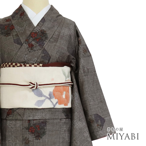 紬 リサイクル 身丈157.8cm 裄62.4cm 袷 デザイン亀甲柄 グレー Mサイズ お洒落 カジュアル しつけ糸 正絹 広衿 Sランク