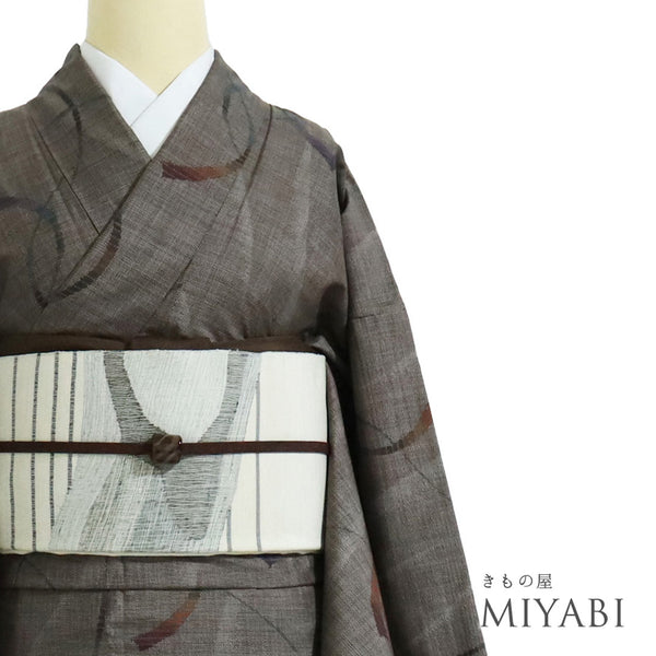 紬 リサイクル 身丈168.8cm 裄64.6cm 袷 曲線柄 ブラウン LLサイズ お洒落 正絹 広衿 Sランク