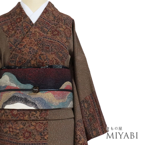 小紋 リサイクル 身丈164.3cm 裄62.6cm 袷 更紗柄 ブラウン Lサイズ お洒落 お洒落 正絹 広衿 Sランク