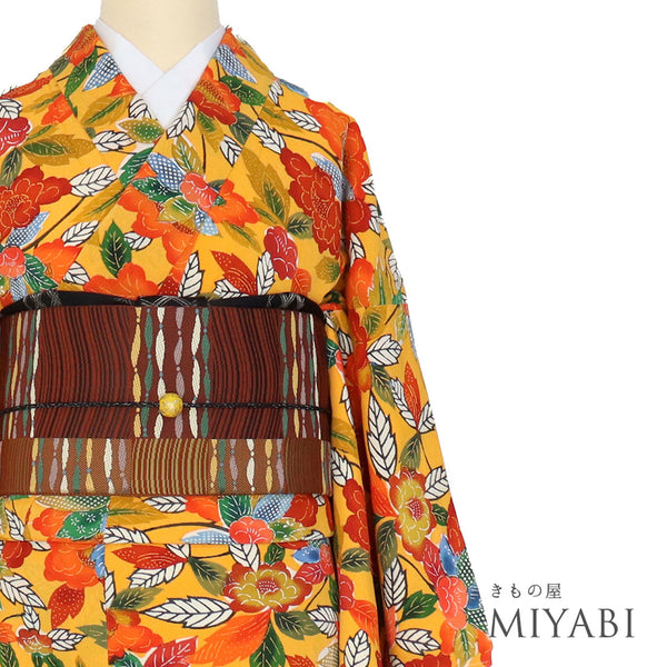 小紋 リサイクル 身丈161.5cm 裄66.4cm 袷 デザイン花柄 オレンジ Lサイズ お洒落 カジュアル 正絹 広衿 Sランク