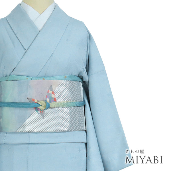 色無地 リサイクル 身丈160.8cm 裄64.6cm 袷 星柄 ブルー Lサイズ セミフォーマル お洒落 一つ紋 正絹 広衿 地紋あり Bランク