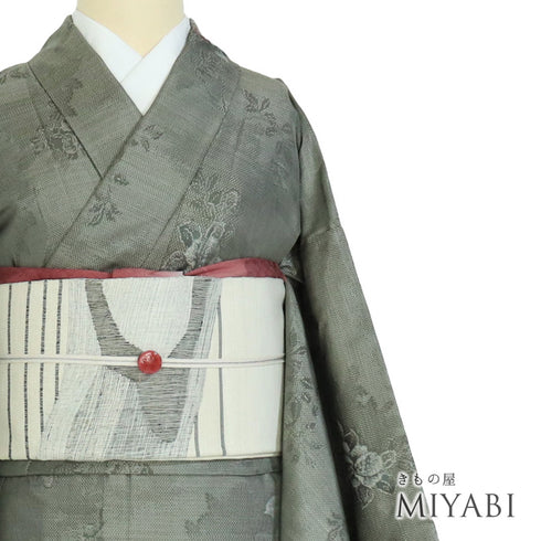 大島紬 リサイクル 身丈156.5cm 裄63.6cm 袷 花柄 グリーン Mサイズ お洒落 カジュアル しつけ糸 正絹 広衿 Sランク