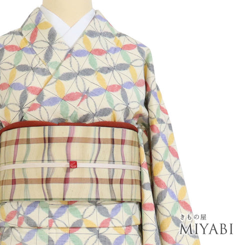 紬 リサイクル 身丈169.5cm 裄66.4cm 袷 格子に七宝柄 ベージュ LLサイズ お洒落 カジュアル しつけ糸 正絹 広衿 Sランク