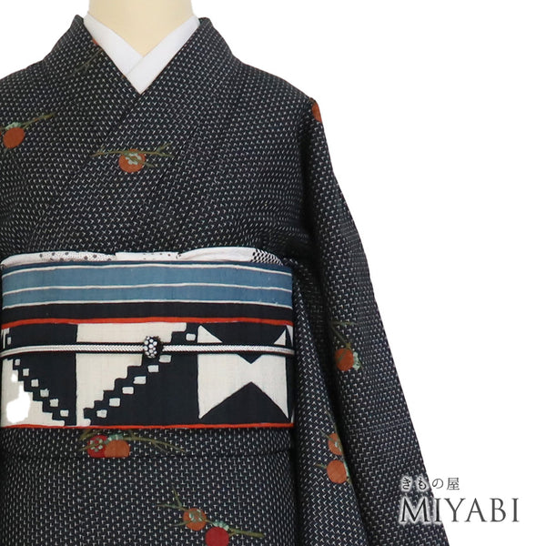 紬 リサイクル 身丈163.7cm 裄66.4cm 袷 絣 柿の枝 型染め ブラック Lサイズ お洒落 カジュアル しつけ糸 正絹 広衿 Sランク