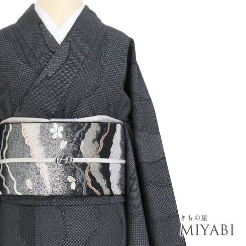 結城紬 リサイクル 身丈171cm 裄68.4cm 袷 ゆったりサイズ 百亀甲絣柄 奥順製 ブラック LLサイズ カジュアル お洒落 証紙 正絹 広衿 Sランク