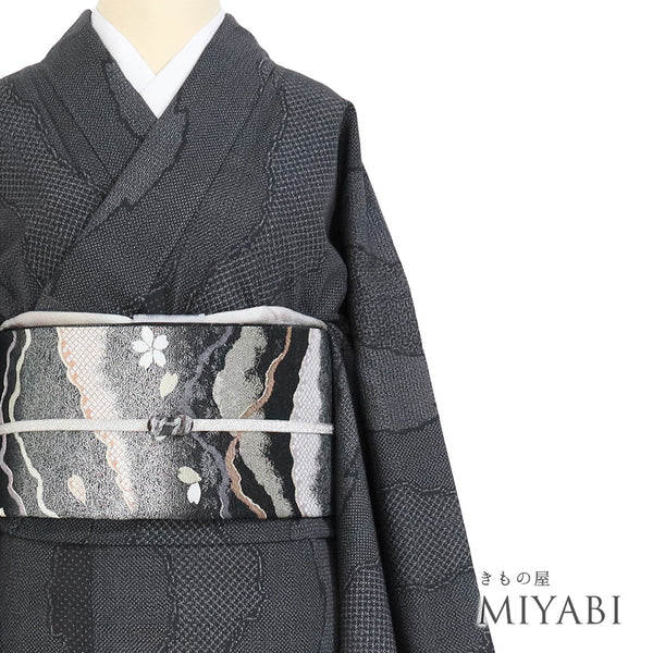 結城紬 リサイクル 身丈171cm 裄68.4cm 袷 ゆったりサイズ 百亀甲絣柄 奥順製 ブラック LLサイズ カジュアル お洒落 証紙 正絹 広衿 Sランク