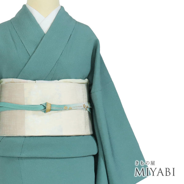 色無地 リサイクル 身丈158.2cm 裄65.2cm 袷 パールトーン加工 萬葉本草木染 グリーン Mサイズ セミフォーマル 証紙 一つ紋 正絹 広衿 地紋あり Sランク