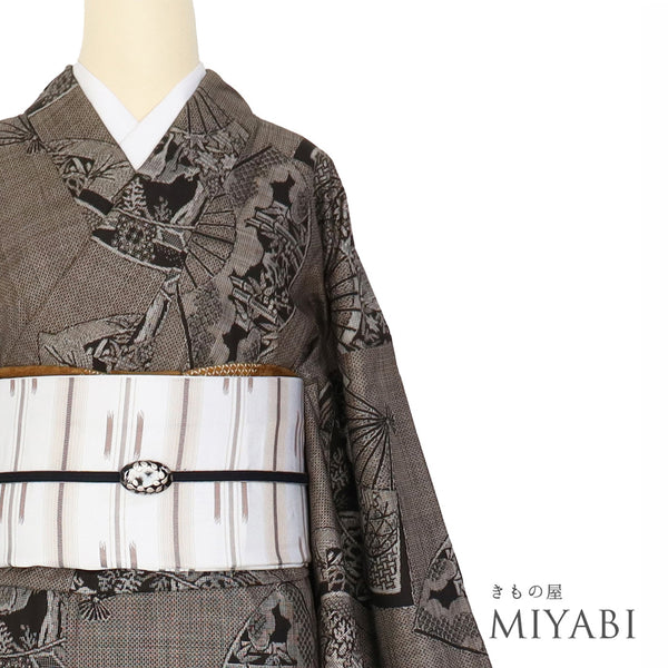 紬 リサイクル 身丈160cm 裄67.2cm 袷 扇面に鹿柄 ブラウン Mサイズ カジュアル お洒落 証紙 正絹 広衿 Aランク