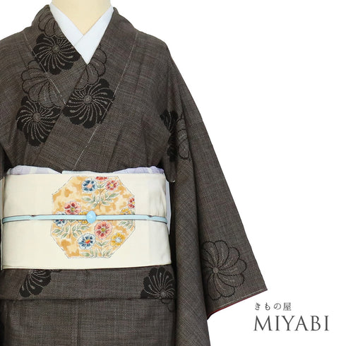 紬 リサイクル 身丈156.5cm 裄63cm 袷 ねじり菊柄 ブラウン Mサイズ お洒落 しつけ糸 正絹 広衿 Sランク