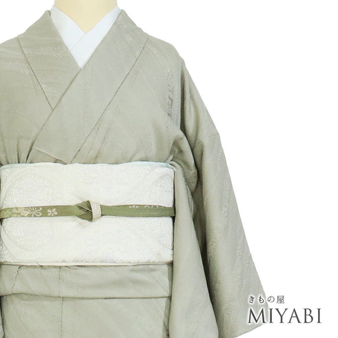 色無地 リサイクル 身丈157.3cm 裄63.2cm 袷 花柄 グリーン Mサイズ セミフォーマル 一つ紋 正絹 広衿 地紋あり Sランク