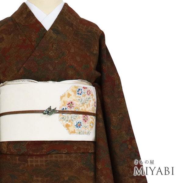 小紋 リサイクル 身丈164.3cm 裄64.2cm 袷 御所車や花柄 地紋 樽本伊勢蔵 ブラウン Lサイズ お洒落 カジュアル 正絹 広衿 Sランク