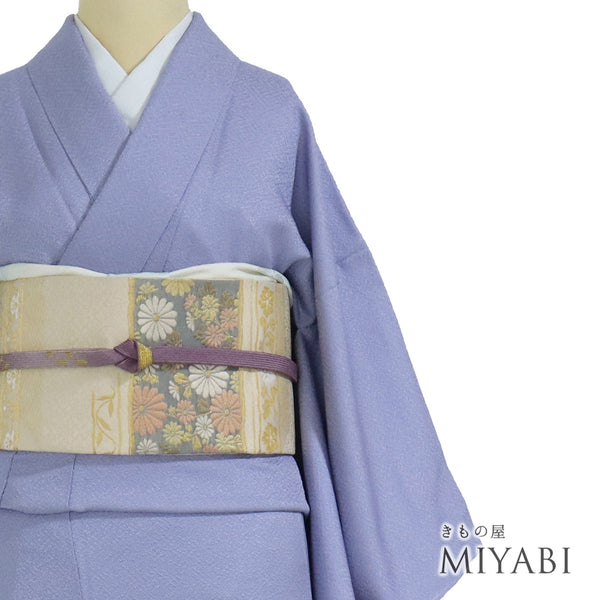 色無地 リサイクル 身丈164cm 裄63.4cm 袷 パープル Lサイズ セミフォーマル 一つ紋 しつけ糸 正絹 広衿 地紋あり Sランク