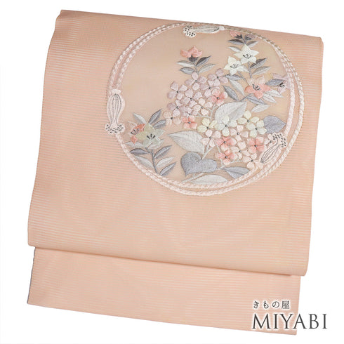 名古屋帯 リサイクル 帯丈352.5cm ポイント柄 組紐丸円に花柄 刺繍 夏物 ピンク Sサイズ 混合 新品・未使用品 お洒落