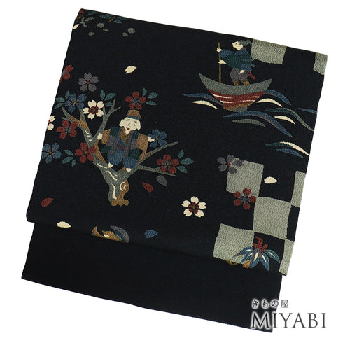 名古屋帯 リサイクル 帯丈371cm 全通 昔話柄 ちりめん ブラック Mサイズ 正絹 未使用品 お洒落 カジュアル