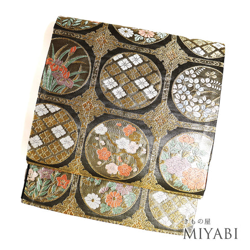 袋帯 リサイクル 帯丈426cm 六通 丸に花菱柄 梅や菊や牡丹柄 花柄 唐織割付文 ゴールド Sサイズ 正絹 未使用品 フォーマル セミフォーマル