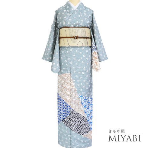 付下げ リサイクル 身丈155.7cm 裄64.6cm 袷 紬 梅鉢模様に裂取り柄 染め ブルー Mサイズ お洒落 正絹 広衿 Aランク