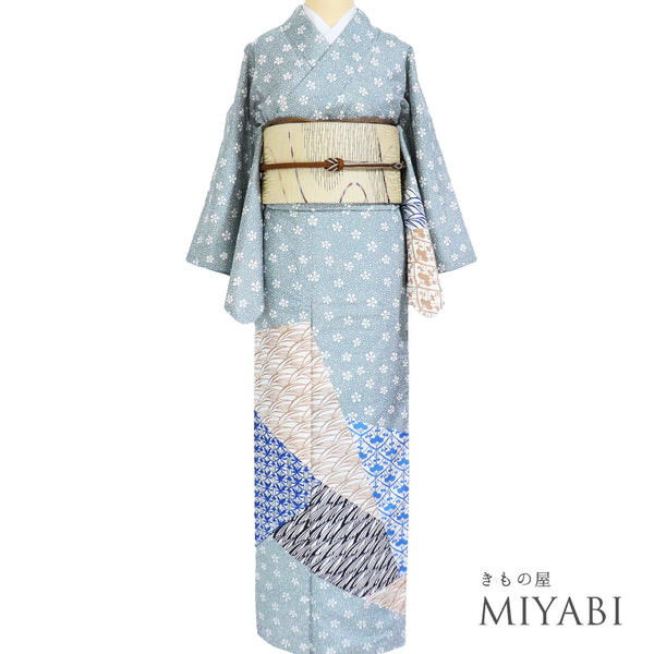 付下げ リサイクル 身丈155.7cm 裄64.6cm 袷 紬 梅鉢模様に裂取り柄 染め ブルー Mサイズ お洒落 正絹 広衿 Aランク