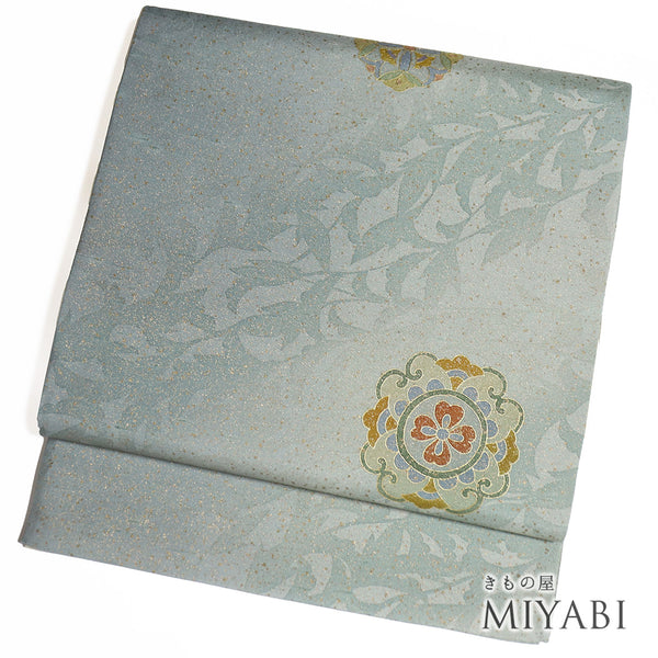 袋帯 リサイクル 帯丈460cm 全通 手織り牛首紬 華紋 染め 無形文化財 グリーン LLサイズ 正絹 新品・未使用品 お洒落