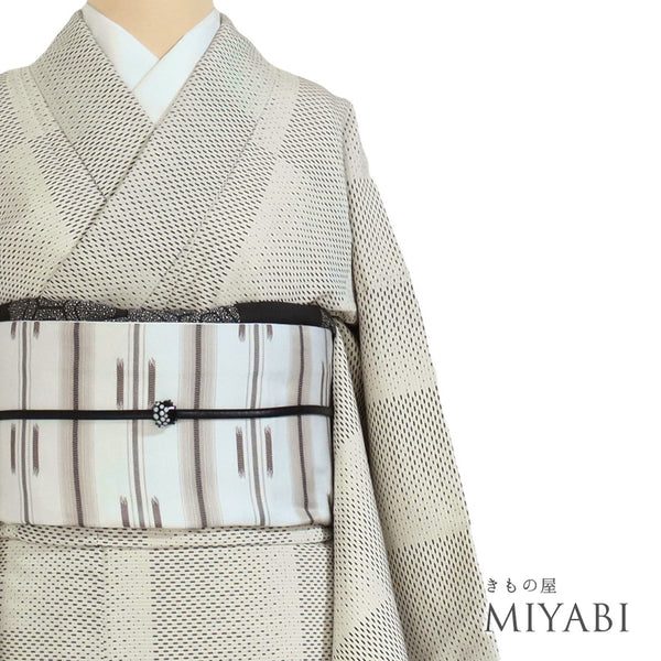 紬 リサイクル 身丈162cm 裄65cm 袷 お召 石畳柄 織りぼかし 地紋 アイボリー Lサイズ お洒落 カジュアル 正絹 広衿 Aランク