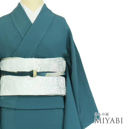 色無地 リサイクル 身丈158cm 裄62.8cm 袷 花井幸子の色 グリーン Mサイズ セミフォーマル 落款 一つ紋 しつけ糸 正絹 広衿 地紋なし Sランク