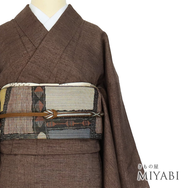 紬 リサイクル 身丈161.5cm 裄65.4cm 袷 ブラウン Lサイズ お洒落 カジュアル しつけ糸 正絹 広衿 Sランク