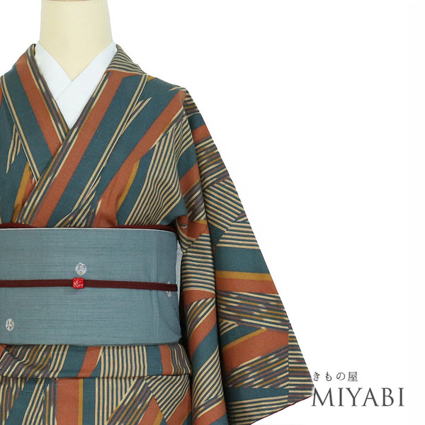 紬 リサイクル 身丈159.8cm 裄64cm 袷 幾何学模様 染め 多色 Mサイズ カジュアル お洒落 正絹 広衿 Sランク