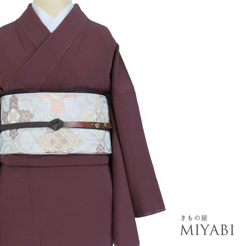 色無地 リサイクル 身丈158.3cm 裄65.8cm 袷 パープル Mサイズ セミフォーマル 落款 一つ紋 しつけ糸 正絹 広衿 地紋なし Sランク