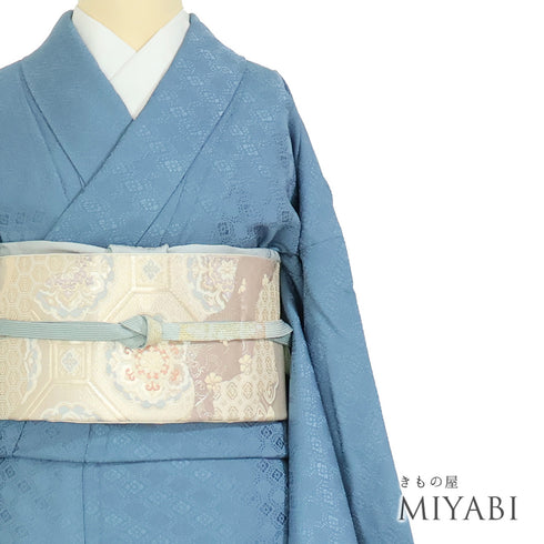 色無地 リサイクル 身丈155.7cm 裄63.4cm 袷 さや型 デザイン花菱柄 ブルー Mサイズ セミフォーマル お洒落 一つ紋 正絹 広衿 地紋あり Sランク