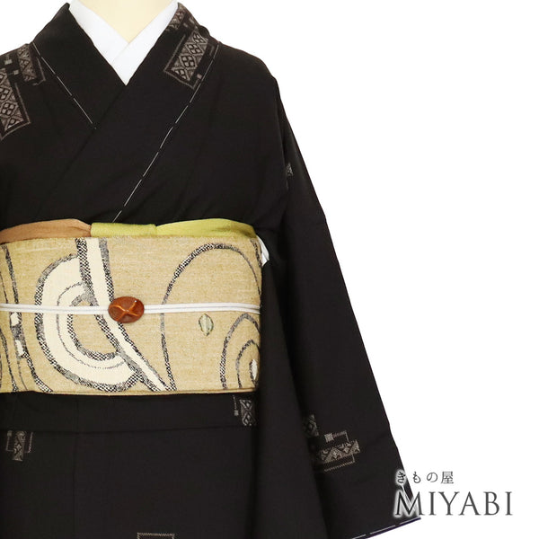 紬 リサイクル 身丈162cm 裄66.8cm 袷 泥染大島紬 飛び柄 ブラウン Lサイズ お洒落 カジュアル 証紙 しつけ糸 正絹 広衿 Sランク