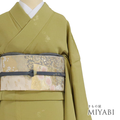 色無地 リサイクル 身丈172.5cm 裄69.8cm 袷 梅柄 作家物 柿本市郎 グリーン LLサイズ セミフォーマル お洒落 落款 一つ紋 しつけ糸 正絹 広衿 地紋あり Sランク