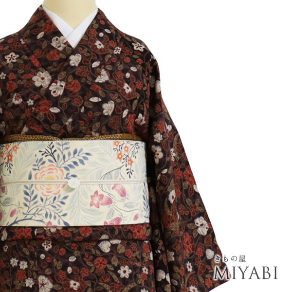 小紋 リサイクル 身丈159.2cm 裄64.8cm 袷 花柄 椿 部分絞り ブラウン Mサイズ お洒落 カジュアル 正絹 広衿 Sランク