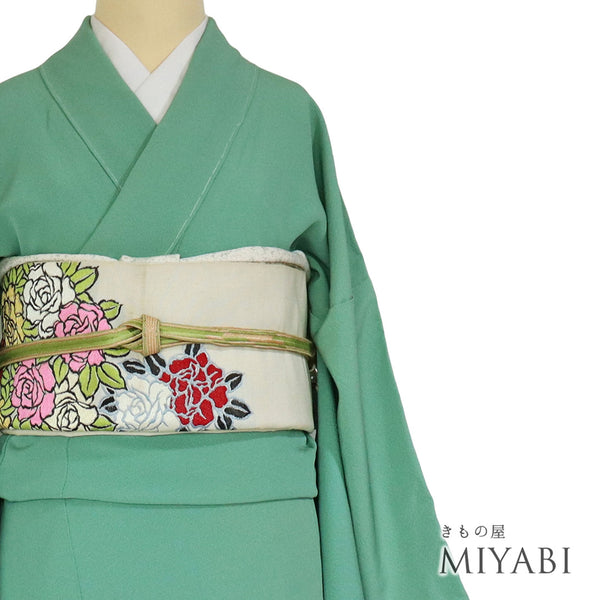 色無地 リサイクル 身丈162.5cm 裄67.2cm 袷 グリーン Lサイズ セミフォーマル 一つ紋 しつけ糸 正絹 広衿 Sランク