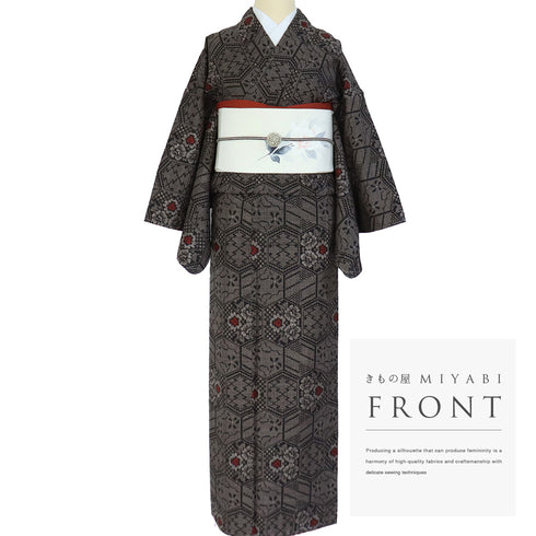 大島紬 リサイクル 身丈162.2cm 裄66cm 袷 デザイン亀甲柄 ブラウン Lサイズ お洒落 カジュアル 証紙 正絹 広衿 Sランク