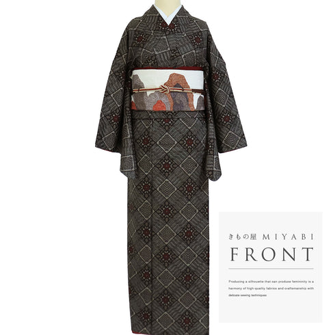 紬 リサイクル 身丈157cm 裄66.8cm 袷 大島紬 龍郷柄 ブラウン Mサイズ カジュアル 正絹 バチ衿 Sランク