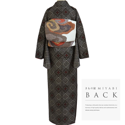 紬 リサイクル 身丈157cm 裄66.8cm 袷 大島紬 龍郷柄 ブラウン Mサイズ カジュアル 正絹 バチ衿 Sランク