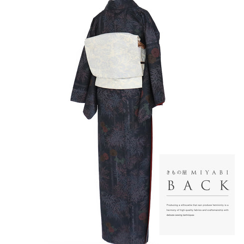 紬 リサイクル 身丈159.4cm 裄64.4cm 袷 染め紬 竹や椿柄 ネイビー Mサイズ お洒落 カジュアル しつけ糸 正絹 広衿 Sランク