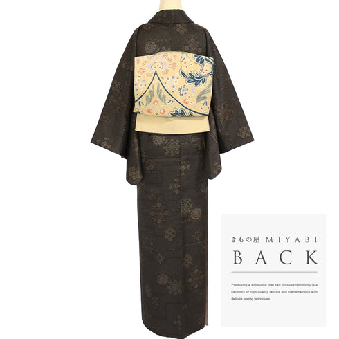 小紋 リサイクル 身丈156.2cm 裄65cm 袷 紬調絣に点描柄 地紋 ブラウン Mサイズ お洒落 カジュアル ポリエステル 洗える着物 広衿 Sランク